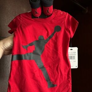 New Jordan two piece set. Red Baby Onesie with Black Jumpman Logo size 6 months
